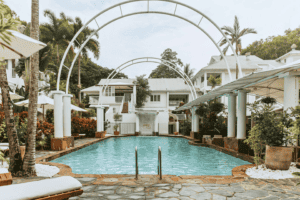The Reef House Adults Retreat Palm Cove view from outside from the pool towards the building